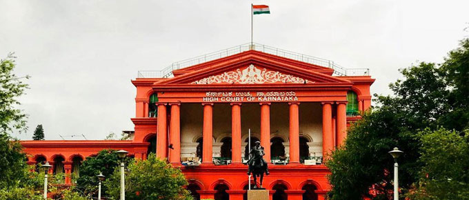 कर्नाटक उच्च न्यायालय ने शौचालय की दीवार पर मोबाइल नंबर लिखकर महिला की गरिमा को ठेस पहुँचाने के मामले में दर्ज प्राथमिकी को रद्द करने से किया इनकार